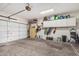 Spacious garage with white walls and ample overhead storage at 9463 W Ross Ave, Peoria, AZ 85382