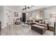 Spacious living room featuring a plush sectional sofa and a ceiling fan for added comfort at 9463 W Ross Ave, Peoria, AZ 85382