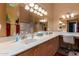 Spacious bathroom with double sinks, vanity, large mirror, and tile floors at 10136 E Southern Ave # 2064, Mesa, AZ 85209