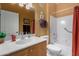 Bathroom with white vanity, sink, mirror, and a shower with a neutral curtain at 10136 E Southern Ave # 2064, Mesa, AZ 85209