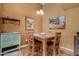 Charming dining area featuring a wooden table and chairs, perfect for Gathering meals and entertaining at 10136 E Southern Ave # 2064, Mesa, AZ 85209