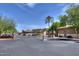 Secured community gate with landscaped entrance and ample parking at 10136 E Southern Ave # 2064, Mesa, AZ 85209