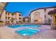 Tranquil pool and hot tub area surrounded by lush landscaping and cozy lounge seating at 10136 E Southern Ave # 2064, Mesa, AZ 85209