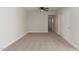 Bedroom featuring neutral carpet, ceiling fan, closet, and ensuite bathroom at 119 E Hampton Ave, Mesa, AZ 85210