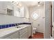 Bright bathroom with blue tiled countertops and colorful fixtures at 1305 Coyote Pass Pass, Carefree, AZ 85377