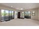 Bright bonus room with large windows overlooking desert landscape at 1305 Coyote Pass Pass, Carefree, AZ 85377