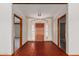 Inviting foyer features red tile flooring, neutral walls, and a striking wood door at 1305 Coyote Pass Pass, Carefree, AZ 85377