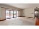 Bright, open living room featuring a wall of sliding glass doors to outdoor patio at 1305 Coyote Pass Pass, Carefree, AZ 85377