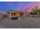 A backyard with a covered patio and a hot tub at 13569 S 175Th Dr, Goodyear, AZ 85338