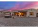 A well kept backyard with a jacuzzi and covered patio at 13569 S 175Th Dr, Goodyear, AZ 85338