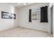 Bright bedroom with carpet flooring and modern art at 13569 S 175Th Dr, Goodyear, AZ 85338