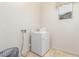 Laundry room with a modern washer and dryer at 13569 S 175Th Dr, Goodyear, AZ 85338