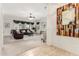 Bright and airy living room featuring plush carpeting, modern décor, and an open floor plan at 13569 S 175Th Dr, Goodyear, AZ 85338