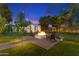 Backyard fire pit with chairs and shed. Outdoor entertaining space at 141 E Bonita Way, Tempe, AZ 85281
