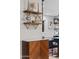Stylish decor on shelves above a wooden cabinet in a bright kitchen at 141 E Bonita Way, Tempe, AZ 85281