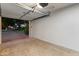 Clean, well-lit garage with an open door, ready for vehicles or storage at 141 E Bonita Way, Tempe, AZ 85281