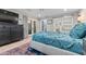 The main bedroom offers a plush bed, a large dresser, and access to a stylish closet at 141 E Bonita Way, Tempe, AZ 85281
