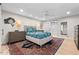 A spacious main bedroom features stylish decor, modern lighting fixtures, and a closet with sliding doors at 141 E Bonita Way, Tempe, AZ 85281