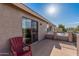 This outdoor balcony features a sliding glass door and ample room for relaxing at 14294 W Edgemont Ave, Goodyear, AZ 85395