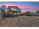 View of backyard, with covered patio and built-in barbecue, ready for landscaping at 1466 E Avenida Fresca --, Casa Grande, AZ 85122