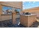 Built in barbecue area with tile countertop and prep station on the back patio at 1466 E Avenida Fresca --, Casa Grande, AZ 85122