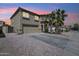 Two-story home featuring desert landscaping, a two-car garage, and classic stucco at 1466 E Avenida Fresca --, Casa Grande, AZ 85122
