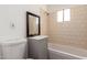 Bathroom featuring a tub and shower combination, along with a modern vanity at 1505 W Fillmore St, Phoenix, AZ 85007