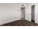View of bedroom showing an open door, closet, and neutral-toned flooring at 1505 W Fillmore St, Phoenix, AZ 85007