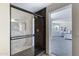 Sleek bathroom features a glass-enclosed shower and elegant fixtures at 1612 E Desert Rose Trl, San Tan Valley, AZ 85143