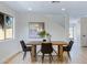 Charming dining room with modern table set and neutral decor at 1612 E Desert Rose Trl, San Tan Valley, AZ 85143