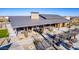 Beautiful building exterior with covered seating and well-maintained landscaping at 16928 W Jenan Rd, Surprise, AZ 85388