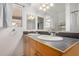 Bathroom featuring a double sink vanity, ample counter space, and well-lit mirrors at 1822 S 39Th St # 7, Mesa, AZ 85206