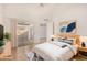 Comfortable bedroom with a king bed, ceiling fan, and sliding glass door to the patio at 1822 S 39Th St # 7, Mesa, AZ 85206