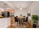 Charming dining area featuring a round table, four chairs, and natural light near the kitchen at 1822 S 39Th St # 7, Mesa, AZ 85206