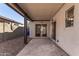 Covered patio with concrete slab and sliding glass doors to house at 1822 S 39Th St # 7, Mesa, AZ 85206