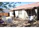 Backyard featuring patio furniture and a shade umbrella at 1837 W Roma Ave, Phoenix, AZ 85015