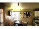 Cozy dining area with a round table and adjacent kitchen space at 1837 W Roma Ave, Phoenix, AZ 85015