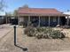 Quaint home with desert landscaping and a red tile roof at 1837 W Roma Ave, Phoenix, AZ 85015