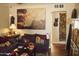 Comfortable living room featuring hardwood floors and eclectic decor at 1837 W Roma Ave, Phoenix, AZ 85015