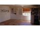 Bright living room with art and hardwood floors, perfect for entertaining or relaxing at 1837 W Roma Ave, Phoenix, AZ 85015