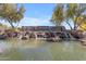 Beautiful community entrance with water feature and landscaping at Sossaman Estates at 18437 E Celtic Manor Dr, Queen Creek, AZ 85142