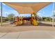 Fun playground with multiple slides and play equipment, perfect for enjoyment at 18437 E Celtic Manor Dr, Queen Creek, AZ 85142