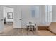 Bright playroom area featuring a small table with chairs and hardwood floors at 18437 E Celtic Manor Dr, Queen Creek, AZ 85142