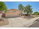 Charming single-story house with a tile roof and a two-car garage at 18643 N 73Rd Ave, Glendale, AZ 85308