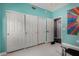 Spacious bedroom with large closet and blue walls at 1865 S Morrison Ln, Gilbert, AZ 85295