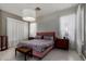 Serene bedroom featuring a cozy bed, matching nightstands, and soft, natural lighting at 1865 S Morrison Ln, Gilbert, AZ 85295