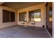 Covered patio with seating area, perfect for relaxing outdoors at 1865 S Morrison Ln, Gilbert, AZ 85295