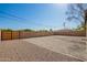 Backyard with gravel, fence, and blue sky at 1919 W Fairmount Ave, Phoenix, AZ 85015