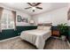 Cozy bedroom with updated gray and dark green decor, neutral carpet, and ample natural light at 1919 W Fairmount Ave, Phoenix, AZ 85015