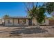 Charming single-story home with a well-maintained front yard and inviting entrance at 1919 W Fairmount Ave, Phoenix, AZ 85015